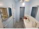 Bathroom featuring a sink, storage, and fixtures at 165 W Alma Ave, Overton, NV 89040