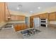 Well-equipped kitchen with stainless steel appliances, ample countertops, and wood cabinets at 2033 Summer Spruce Pl # 102, Las Vegas, NV 89134