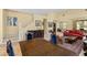 Bright and airy living space with staircase and a formal dining area at 2033 Summer Spruce Pl # 102, Las Vegas, NV 89134