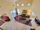 Open living space with high ceilings and a view of the backyard patio at 2033 Summer Spruce Pl # 102, Las Vegas, NV 89134
