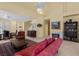 Cozy living room featuring a fireplace, built-in bookshelves, and elegant furniture at 2033 Summer Spruce Pl # 102, Las Vegas, NV 89134