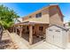 A delightful backyard featuring a covered patio with furnishings and a convenient storage shed at 2037 Merano Ct, Las Vegas, NV 89123
