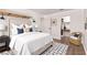 Beautiful bedroom features a plush bed, wood floors, and a walk-in closet at 2037 Merano Ct, Las Vegas, NV 89123