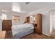 Bright bedroom with hardwood floors, built in shelving and drawers, and natural light at 2037 Merano Ct, Las Vegas, NV 89123