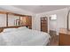 Cozy bedroom with wood floors, built in shelving, and a walk-in closet at 2037 Merano Ct, Las Vegas, NV 89123