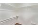 Walk-in closet features white shelving and hardwood floors at 2037 Merano Ct, Las Vegas, NV 89123