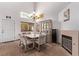 Dining room featuring natural light, tile floors, and traditional decor at 2037 Merano Ct, Las Vegas, NV 89123