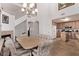 Open dining area connected to the kitchen, with tile floors and natural light at 2037 Merano Ct, Las Vegas, NV 89123