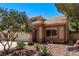 Beautiful two-story home featuring a two-car garage, desert landscaping, and an inviting entrance at 2037 Merano Ct, Las Vegas, NV 89123