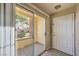 Condo balcony overlooking a beautifully landscaped neighborhood through a sliding glass door at 2120 Ramrod Ave # 2216, Henderson, NV 89014