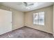 Bedroom featuring neutral walls, carpet, window with blinds, and ceiling fan at 2120 Ramrod Ave # 2216, Henderson, NV 89014