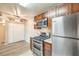A kitchen featuring stainless steel appliances, granite countertops and ample cabinet space at 2120 Ramrod Ave # 2216, Henderson, NV 89014