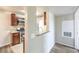 Modern kitchen with stainless steel appliances, granite countertops, and dark wood cabinets at 2120 Ramrod Ave # 2216, Henderson, NV 89014