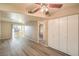 The living room has hardwood floors, a sliding glass door, and lots of natural light at 2120 Ramrod Ave # 2216, Henderson, NV 89014