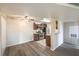 Open concept living area with hardwood floors, seamlessly flowing into the kitchen at 2120 Ramrod Ave # 2216, Henderson, NV 89014