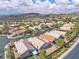 Wide shot of a community featuring well-maintained homes and desert landscaping, showcasing a peaceful environment at 2271 Smokey Sky Dr, Henderson, NV 89052