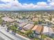 Expansive aerial view of a residential neighborhood with mountain views in the distance at 2271 Smokey Sky Dr, Henderson, NV 89052