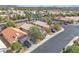 Overhead shot of home in a quiet residential neighborhood with a desert landscape at 2271 Smokey Sky Dr, Henderson, NV 89052