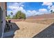 Large, private backyard featuring a xeriscaped landscape and block wall creating a serene outdoor space at 2271 Smokey Sky Dr, Henderson, NV 89052