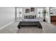 Comfortable bedroom with neutral carpet, natural light, and minimalist decor at 2271 Smokey Sky Dr, Henderson, NV 89052
