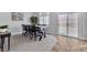 Bright dining area boasts sliding glass door access to the back, perfect for indoor-outdoor living at 2271 Smokey Sky Dr, Henderson, NV 89052
