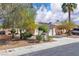 Charming single-story home with desert landscaping, a two-car garage and tile roof at 2271 Smokey Sky Dr, Henderson, NV 89052
