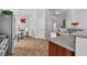 Bright, efficient kitchen with stainless steel appliances and seamless access to the dining area at 2271 Smokey Sky Dr, Henderson, NV 89052