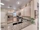 Cozy kitchen with granite countertops, stainless steel appliances, and ample cabinet space at 2522 Darda St, Henderson, NV 89044