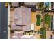Overhead shot of the home shows the colorful roof and desert landscaping in the backyard at 2575 Hazelburn Ave, Henderson, NV 89044