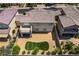 Bird's eye view of backyard featuring desert landscaping, turf, and a covered patio at 2575 Hazelburn Ave, Henderson, NV 89044