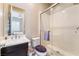 Modern bathroom with sleek vanity, glass shower, and neutral tones for a spa-like experience at 2575 Hazelburn Ave, Henderson, NV 89044