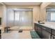 Bathroom featuring a spacious walk-in shower with pebble flooring and tile surround at 2575 Hazelburn Ave, Henderson, NV 89044