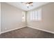 Bright bedroom with a ceiling fan and shuttered windows, offers a serene retreat at 2575 Hazelburn Ave, Henderson, NV 89044
