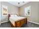 Comfortable bedroom with plush carpet, warm wall color, and shuttered windows providing natural light at 2575 Hazelburn Ave, Henderson, NV 89044