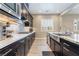 Beautiful kitchen featuring stainless steel appliances, granite countertops, and tile backsplash at 2575 Hazelburn Ave, Henderson, NV 89044
