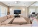 Open living room with comfortable seating, hardwood floors, and neutral paint at 2575 Hazelburn Ave, Henderson, NV 89044