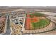 An aerial view displays the baseball and soccer fields with nearby neighborhoods at 2575 Hazelburn Ave, Henderson, NV 89044