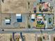 Expansive aerial view of estate featuring multiple buildings, pool, and desert landscaping at 2851 Winchester Ave, Pahrump, NV 89048