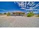 Exterior of the barn with open sides and gravel ground at 2851 Winchester Ave, Pahrump, NV 89048