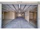 Interior of the barn featuring stalls and a ceiling fan at 2851 Winchester Ave, Pahrump, NV 89048