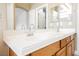 Bathroom featuring a double sink vanity with ample counter space and storage cabinets at 3312 Speckle Summer Pl # 3, North Las Vegas, NV 89084
