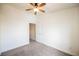Cozy bedroom features neutral carpet, white walls, and a ceiling fan for added comfort at 3312 Speckle Summer Pl # 3, North Las Vegas, NV 89084