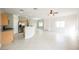 Well-lit kitchen featuring stainless steel appliances and tiled floors, opening up to the living area at 3312 Speckle Summer Pl # 3, North Las Vegas, NV 89084