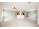 Open floor plan with tiled floors and an eat-in kitchen with stainless appliances at 3312 Speckle Summer Pl # 3, North Las Vegas, NV 89084