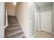 Carpeted staircase leading to the upper level of the home at 3312 Speckle Summer Pl # 3, North Las Vegas, NV 89084