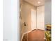 Stylish entryway with a decorative table, large mirror, and hardwood floors at 35 E Agate Ave # 208, Las Vegas, NV 89123