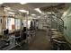 Well-equipped fitness center with modern weight machines and a spiral staircase feature at 35 E Agate Ave # 208, Las Vegas, NV 89123
