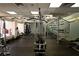 Well-equipped gym featuring modern exercise machines and a sleek spiral staircase at 35 E Agate Ave # 208, Las Vegas, NV 89123