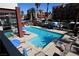 Inviting pool area with comfortable lounge chairs and a refreshing swimming pool at 35 E Agate Ave # 208, Las Vegas, NV 89123