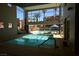 Indoor pool area featuring a hot tub and access to an outdoor swimming pool area at 35 E Agate Ave # 208, Las Vegas, NV 89123